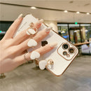 Capinha de Celular para Iphone com Bracelete de Segurança em Corações