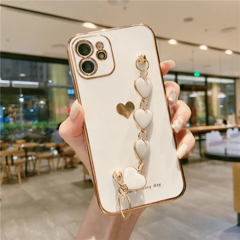 Capinha de Celular para Iphone com Bracelete de Segurança em Corações